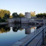 Lock at the entrance to the Lachine Canal near Old Montreal, reflected in calm water
