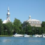 Sainte-Famille church and old convent seen from the St. Lawrence River in Boucherville
